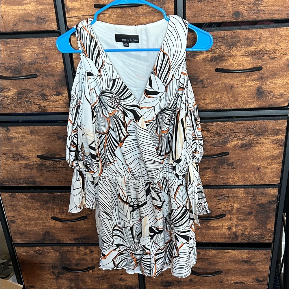 Adelyn Rae Black and Orange Patterned Romper